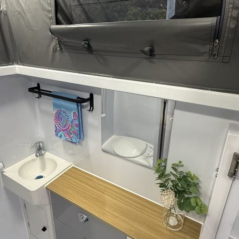 BATHROOM SINK AND CUPBOARD